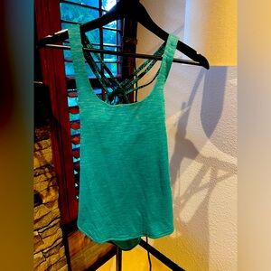 Lululemon strappy tank top with in built support. Worn once in Photoshoot